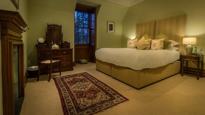 Suite-5-bedroom-at-dusk-687×430
