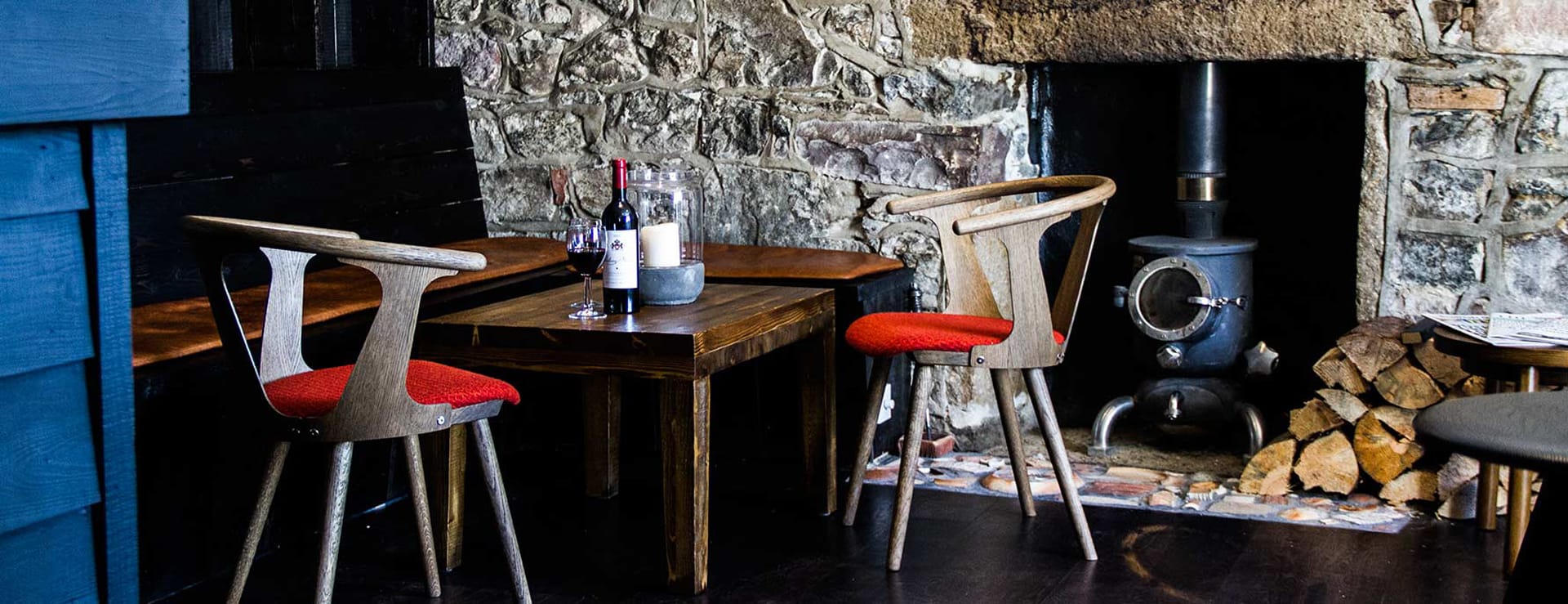 bottle of wine in rustic dining area on the Isle of Skye