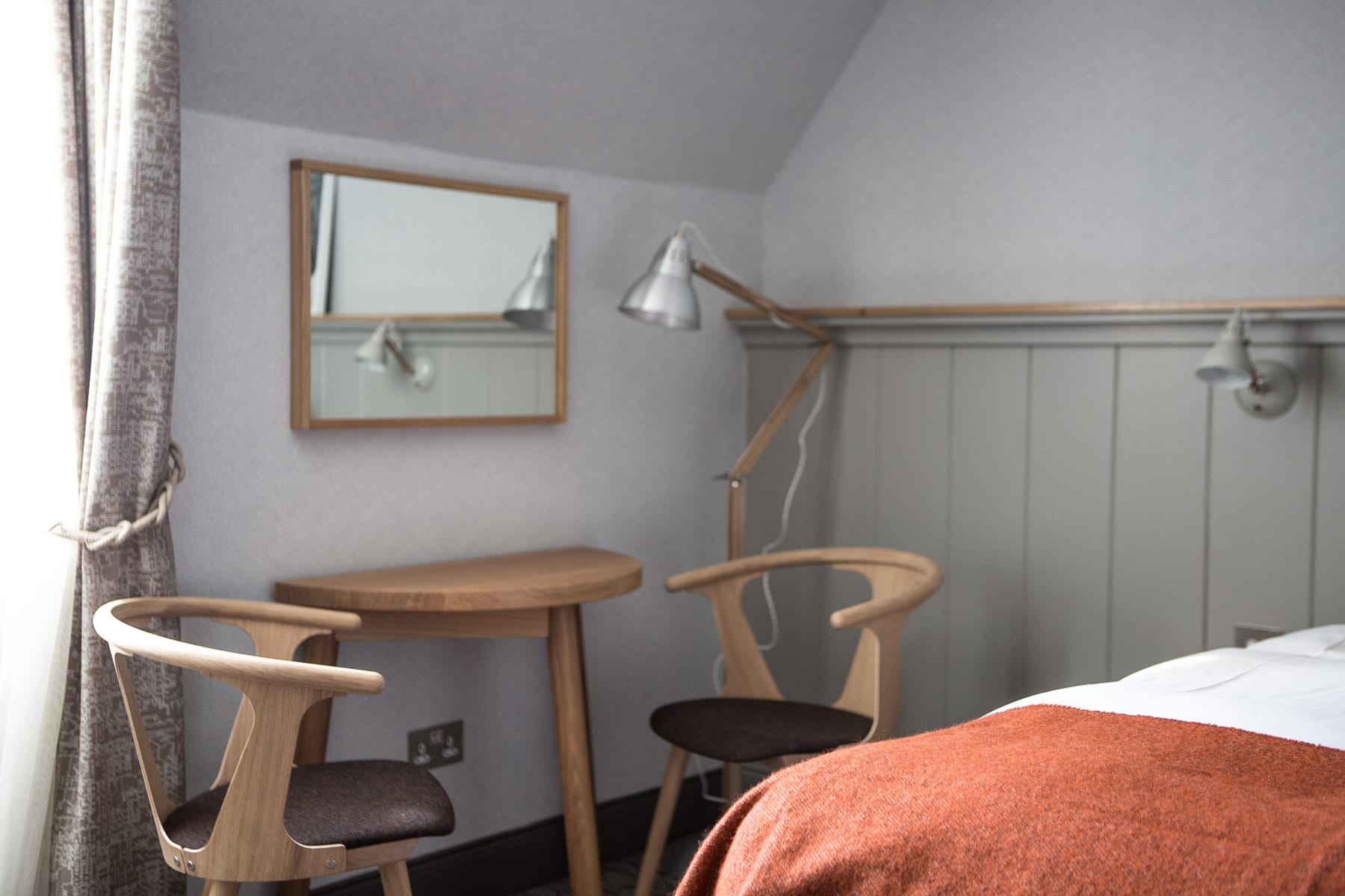 seating and table in room at The Bosville Hotel